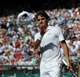Day 6 Sat 25 Jun 2011 - Roger Federer (SUI) throws his head band to the crowd after his victory over David Nalbandian (ARG) in todays Gentlemen's Singles Third Round match